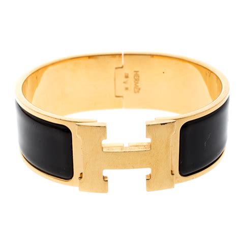 hermes bracelet black and gold price|Hermes h bracelet price.